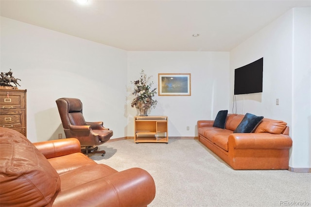 living area with carpet flooring and baseboards
