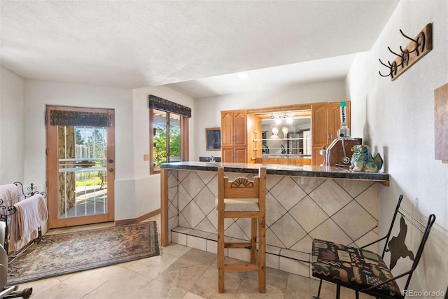 bar with light tile patterned flooring