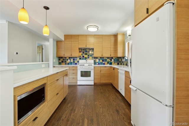 kitchen featuring white appliances, a sink, light brown cabinetry, light countertops, and tasteful backsplash