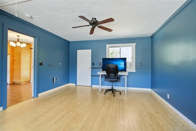 office area featuring wood finished floors, a chandelier, and baseboards