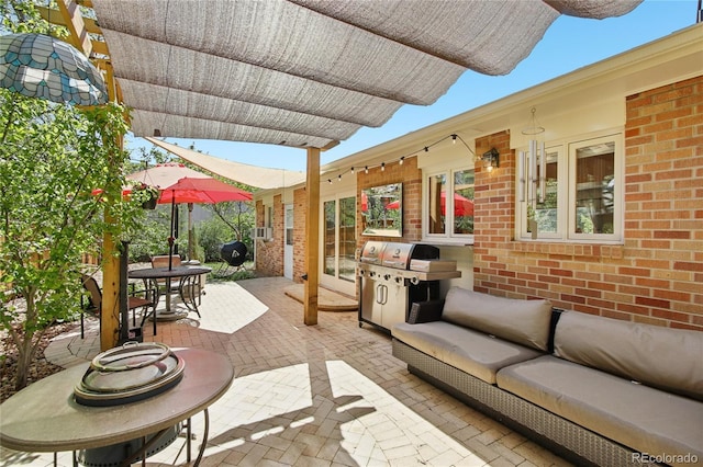view of patio / terrace featuring outdoor dining area and an outdoor living space