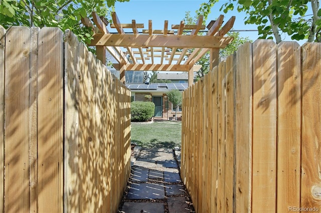 gate with fence and a pergola