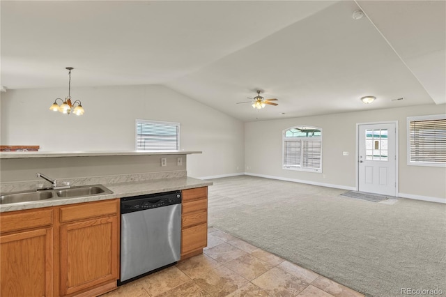 kitchen with vaulted ceiling, ceiling fan with notable chandelier, dishwasher, sink, and light carpet