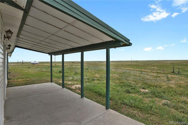 view of patio / terrace with a rural view