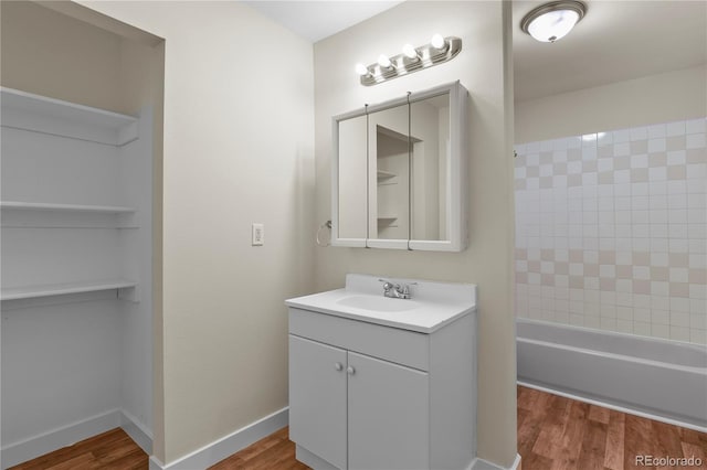 bathroom with vanity and hardwood / wood-style flooring