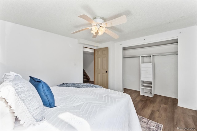 6447 Jonathan Ct, Colorado Springs, CO 80918 - bedroom featuring a textured ceiling, wood finished floors, ceiling fan, and a closet