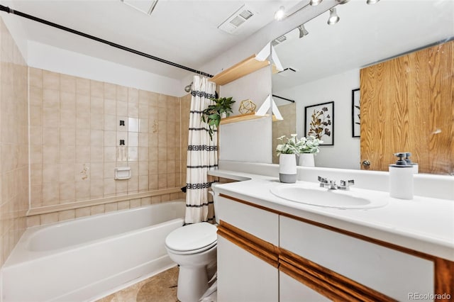 6447 Jonathan Ct, Colorado Springs, CO 80918 - bathroom with vanity, tile patterned flooring, visible vents, toilet, and shower / tub combo