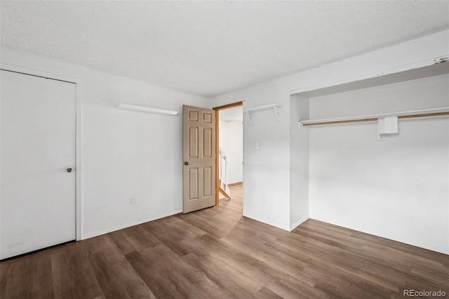 6447 Jonathan Ct, Colorado Springs, CO 80918 - unfurnished bedroom with baseboards and wood finished floors