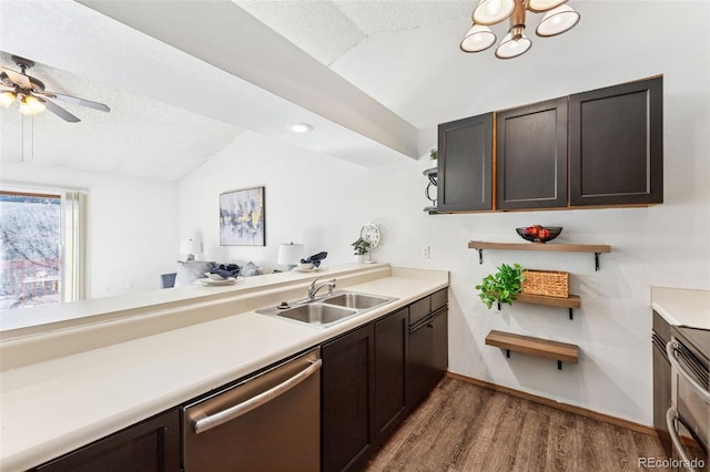 6447 Jonathan Ct, Colorado Springs, CO 80918 - kitchen featuring a sink, a textured ceiling, appliances with stainless steel finishes, and lofted ceiling