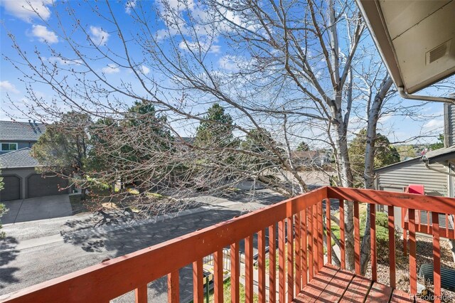 6447 Jonathan Ct, Colorado Springs, CO 80918 - wooden terrace featuring concrete driveway