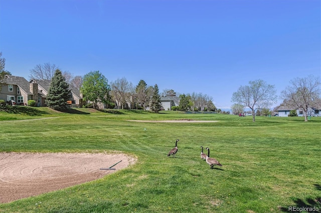 2491 S Xanadu Way Unit A, Aurora, CO 80014 - view of community with a residential view and a lawn