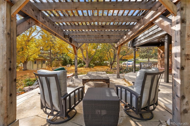 view of patio with a pergola, an outdoor hangout area, and an outbuilding