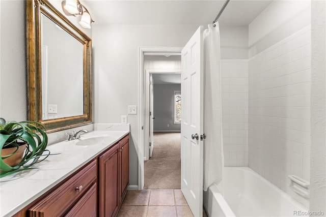 bathroom with vanity, tile patterned flooring, and shower / bath combo with shower curtain