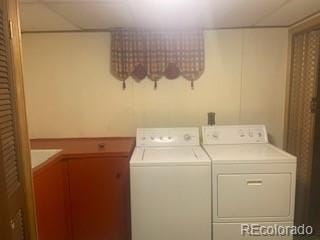 laundry room with washer and dryer