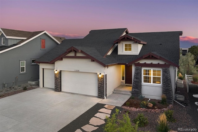 view of front of property featuring a garage