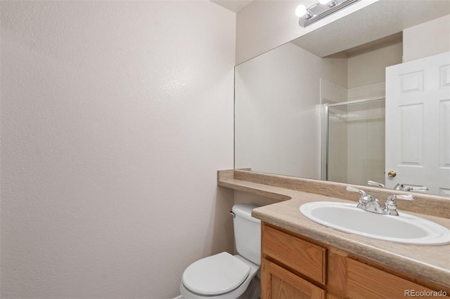 4839 Spotted Horse Dr, Colorado Springs, CO 80923 - bathroom with a shower with shower door and vanity