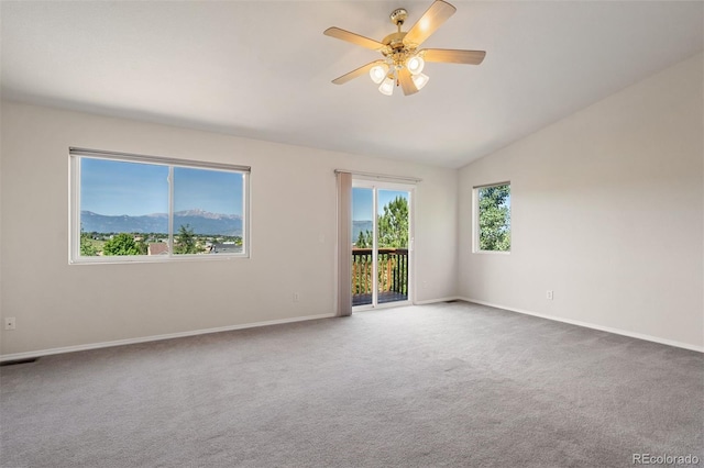 4839 Spotted Horse Dr, Colorado Springs, CO 80923 - empty room with carpet flooring, lofted ceiling, and a ceiling fan