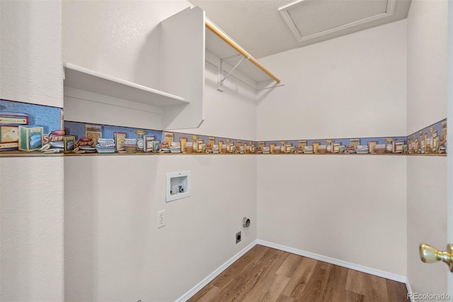 4839 Spotted Horse Dr, Colorado Springs, CO 80923 - washroom with washer hookup, wood finished floors, attic access, and hookup for an electric dryer