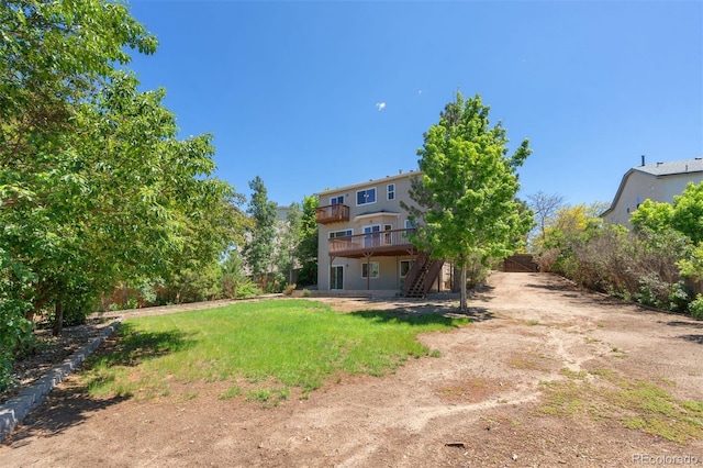 4839 Spotted Horse Dr, Colorado Springs, CO 80923 - view of yard featuring stairway and a deck