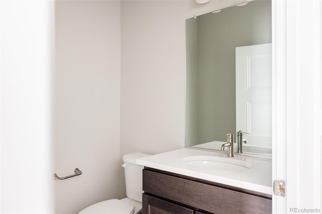 6307 Dayton Ct, Denver, CO 80238 - half bath with vanity and toilet