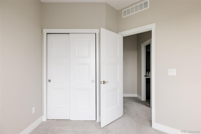6307 Dayton Ct, Denver, CO 80238 - unfurnished bedroom with light carpet, a closet, and baseboards