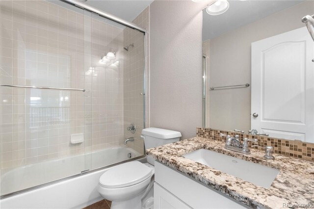 23870 E Dorado Pl, Aurora, CO 80016 - full bath featuring toilet, bath / shower combo with glass door, and vanity