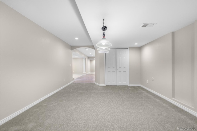 23870 E Dorado Pl, Aurora, CO 80016 - empty room featuring arched walkways, carpet, baseboards, and recessed lighting