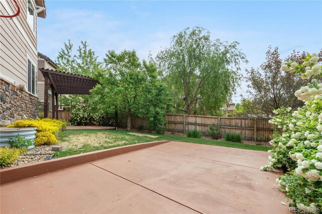 23870 E Dorado Pl, Aurora, CO 80016 - fenced backyard with a patio area and a pergola