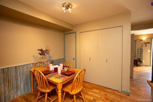 dining area with light wood finished floors