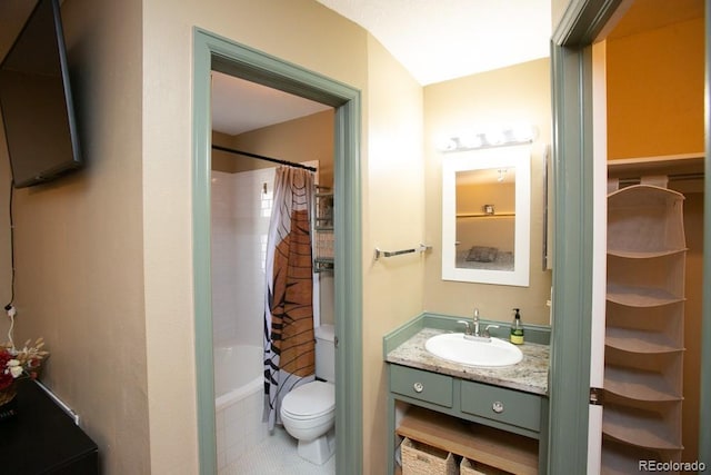 full bathroom featuring vanity, toilet, and shower / bath combo with shower curtain