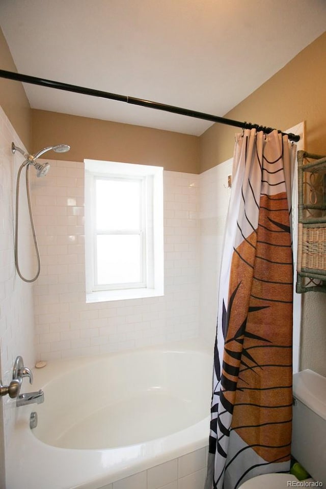 bathroom with shower / bath combo