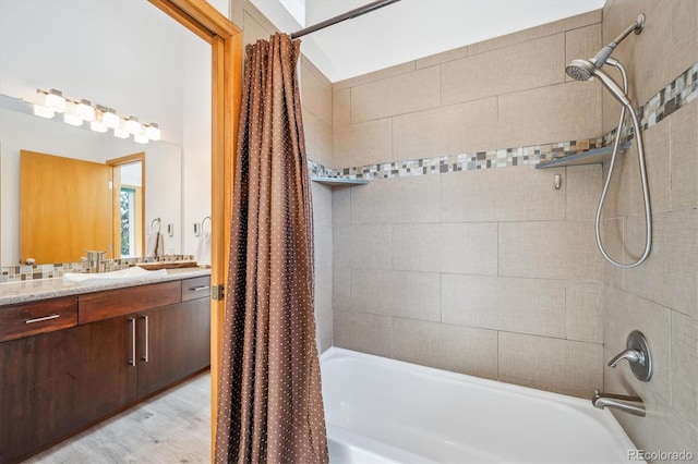 7350 Timber Trail Rd, Evergreen, CO 80439 - full bathroom featuring shower / tub combo with curtain, wood finished floors, and vanity