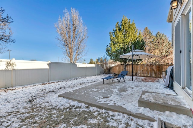 view of snowy yard