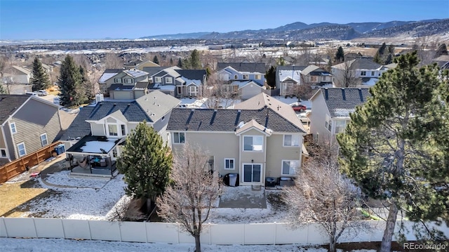 drone / aerial view featuring a mountain view