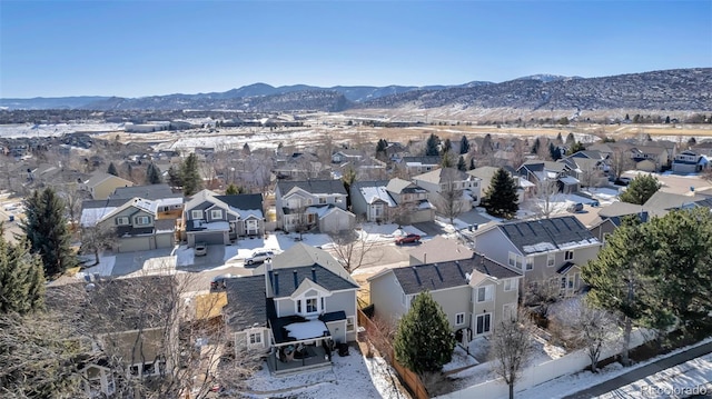 drone / aerial view featuring a mountain view