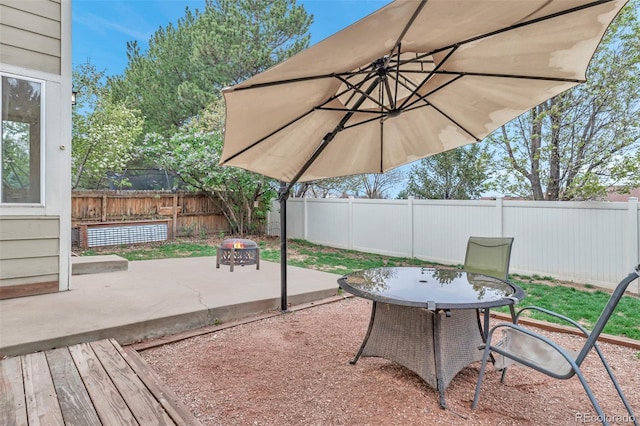12047 W Coal Mine Dr, Littleton, CO 80127 - view of patio / terrace with outdoor dining area and a fenced backyard