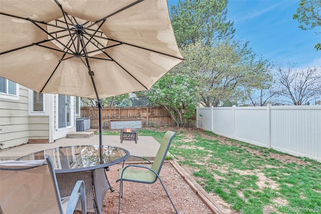 12047 W Coal Mine Dr, Littleton, CO 80127 - view of patio / terrace featuring outdoor dining space and a fenced backyard