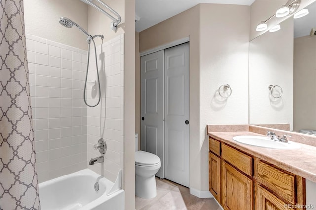 12047 W Coal Mine Dr, Littleton, CO 80127 - full bathroom featuring a closet, shower / tub combo, toilet, tile patterned floors, and vanity