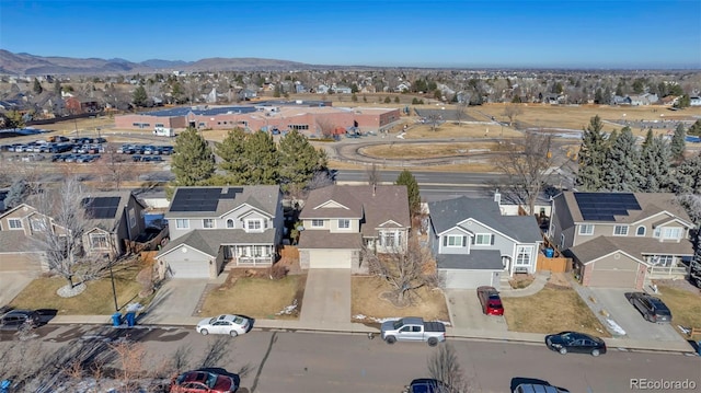 12047 W Coal Mine Dr, Littleton, CO 80127 - drone / aerial view featuring a residential view and a mountain view