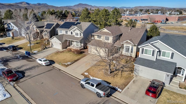 12047 W Coal Mine Dr, Littleton, CO 80127 - drone / aerial view featuring a mountain view and a residential view