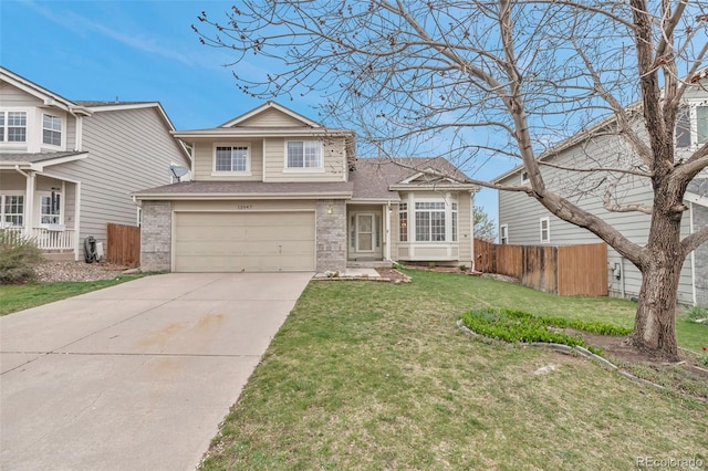 12047 W Coal Mine Dr, Littleton, CO 80127 - traditional-style house with fence, brick siding, driveway, a garage, and a front yard