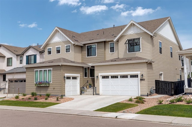 11142 Bright Sky St, Littleton, CO 80125 - view of front of property with board and batten siding, a garage, driveway, and roof with shingles