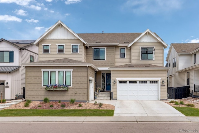 11142 Bright Sky St, Littleton, CO 80125 - view of front facade featuring a garage, concrete driveway, and board and batten siding