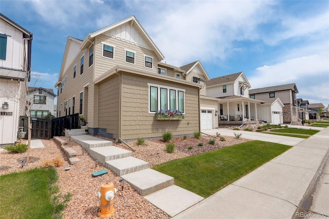 11142 Bright Sky St, Littleton, CO 80125 - view of front facade featuring a residential view, board and batten siding, and concrete driveway