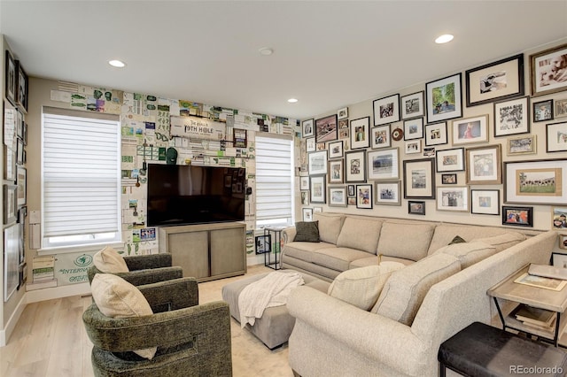 11142 Bright Sky St, Littleton, CO 80125 - living area with recessed lighting, light wood finished floors, and wallpapered walls