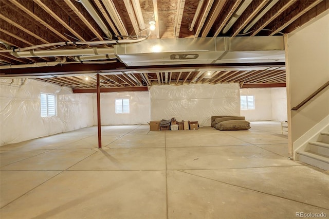 11142 Bright Sky St, Littleton, CO 80125 - basement with healthy amount of natural light and stairs