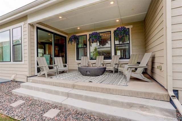11142 Bright Sky St, Littleton, CO 80125 - porch featuring a fire pit