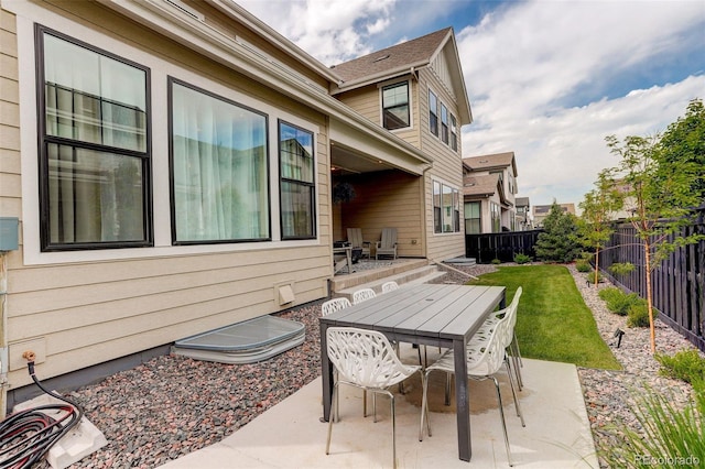 11142 Bright Sky St, Littleton, CO 80125 - fenced backyard with a patio and outdoor dining space