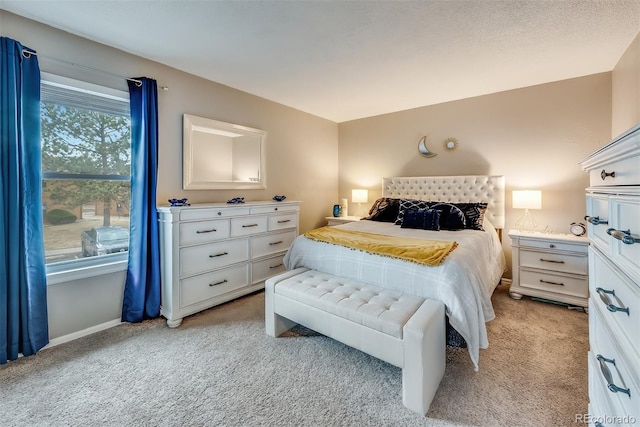 bedroom with light colored carpet