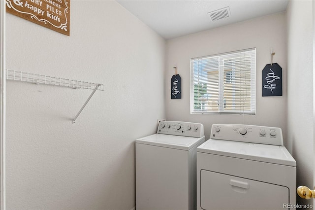 7171 Canyon Way, Frederick, CO 80504 - laundry area with washer and clothes dryer
